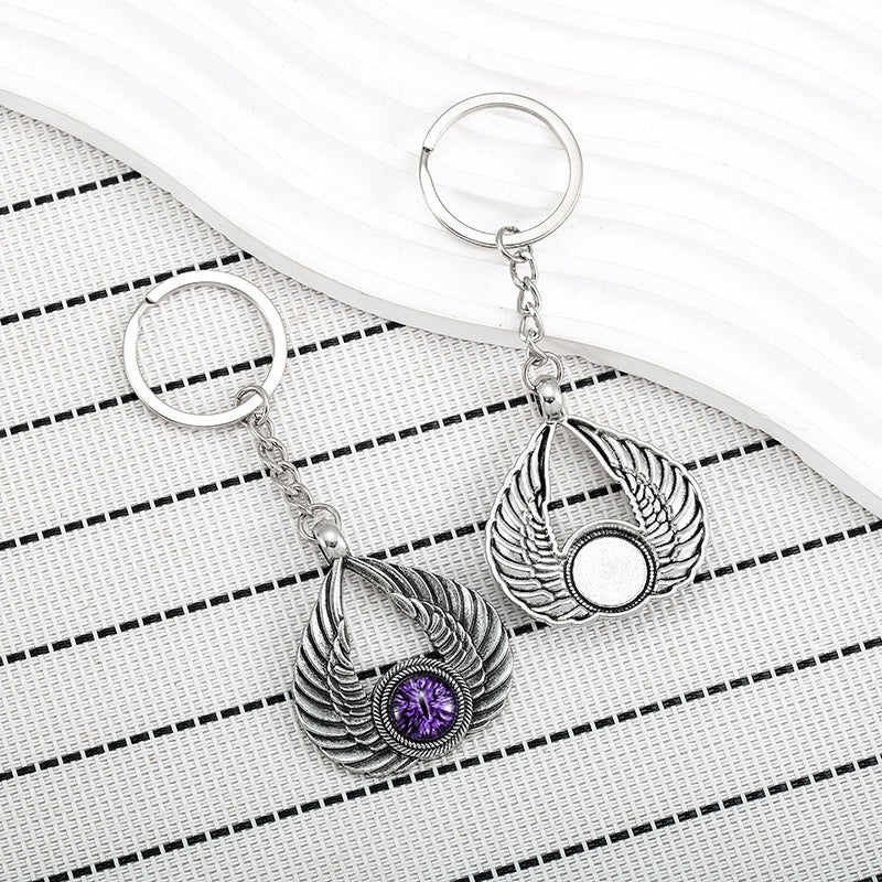 Wholesale Angel Wings Demon Eyes Zinc Alloy Keychain